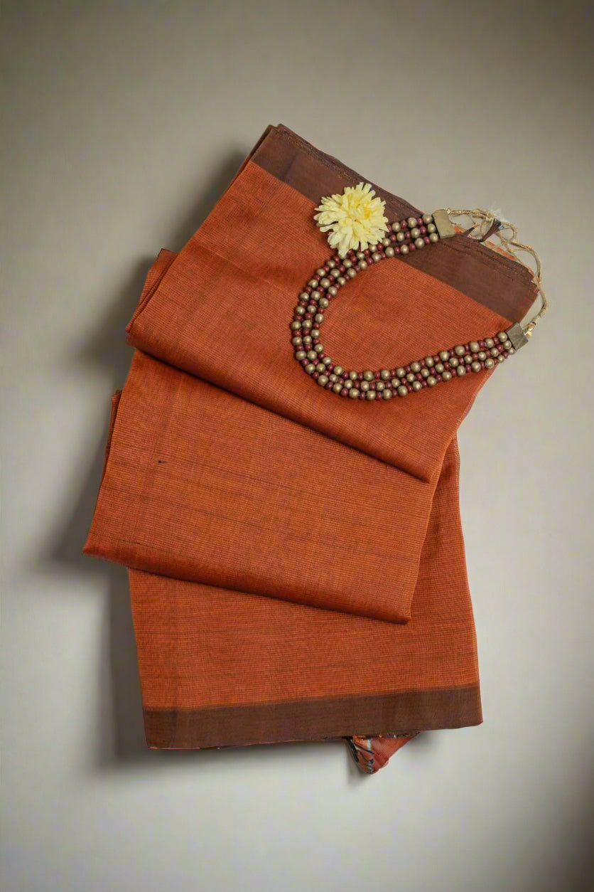 Handwoven Mangalagiri saree in pure silk and cotton blend in rust orange