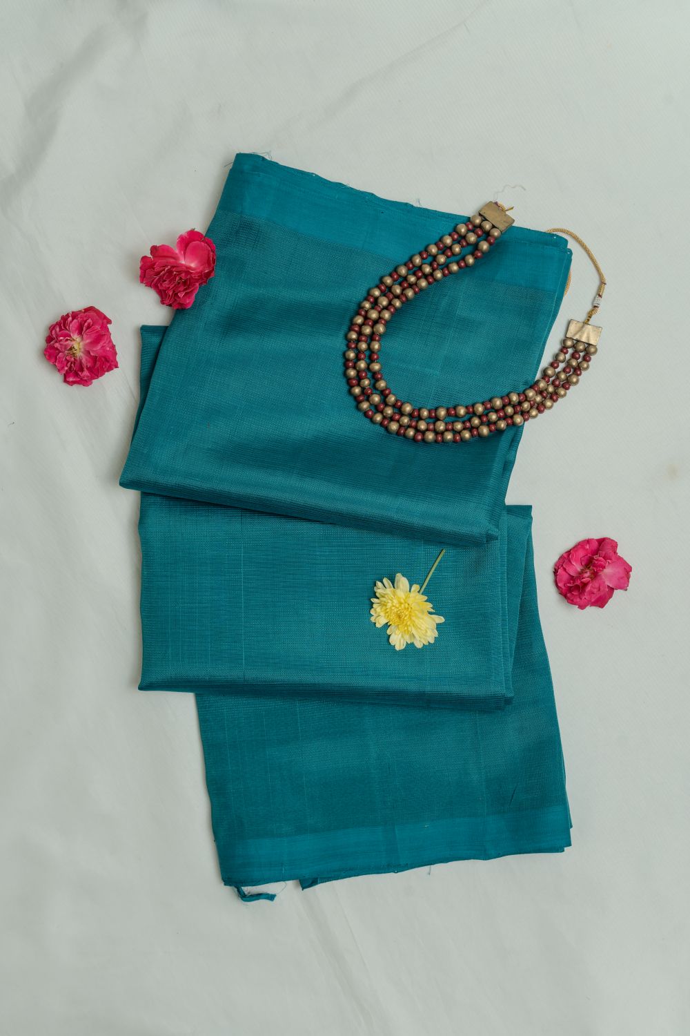 Handwoven Mangalagiri saree in pure silk and cotton blend in teal blue